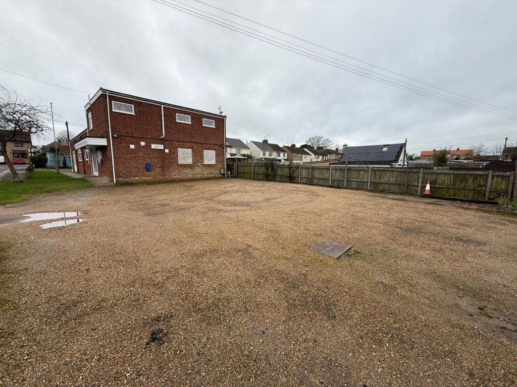 Lot: 77 - TWO PLOTS OF FREEHOLD LAND - Right side of land showing building